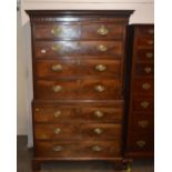 A George III mahogany chest on chest, the upper section with stepped dentil cornice above two