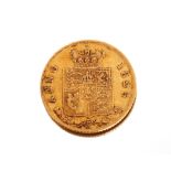 An 1825 gold half Sovereign
