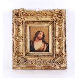 An antique hand coloured print, image of Christ contained in a decorative gilt frame