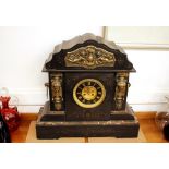 A 19th Century French marble and gilt metal mounted mantel clock of large proportions, architectural