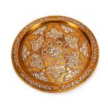 An intricately worked 19th Century Cairo ware brass, copper and silvered dish, 29cm dia.; and four