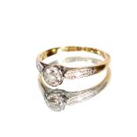 A diamond solitaire ring, illusion set, marked 18ct and Plat