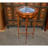 A late 19th Century painted satinwood Bijouterie table, of octagonal form, raised on slender