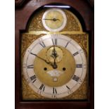 A George III mahogany long case clock, by J Gullock, Rochford, the hood surmounted by a carved