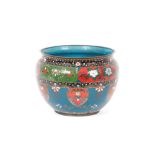 An oriental cloisonné jardinière of bluster form, decorated flowers and motifs, blue interior,