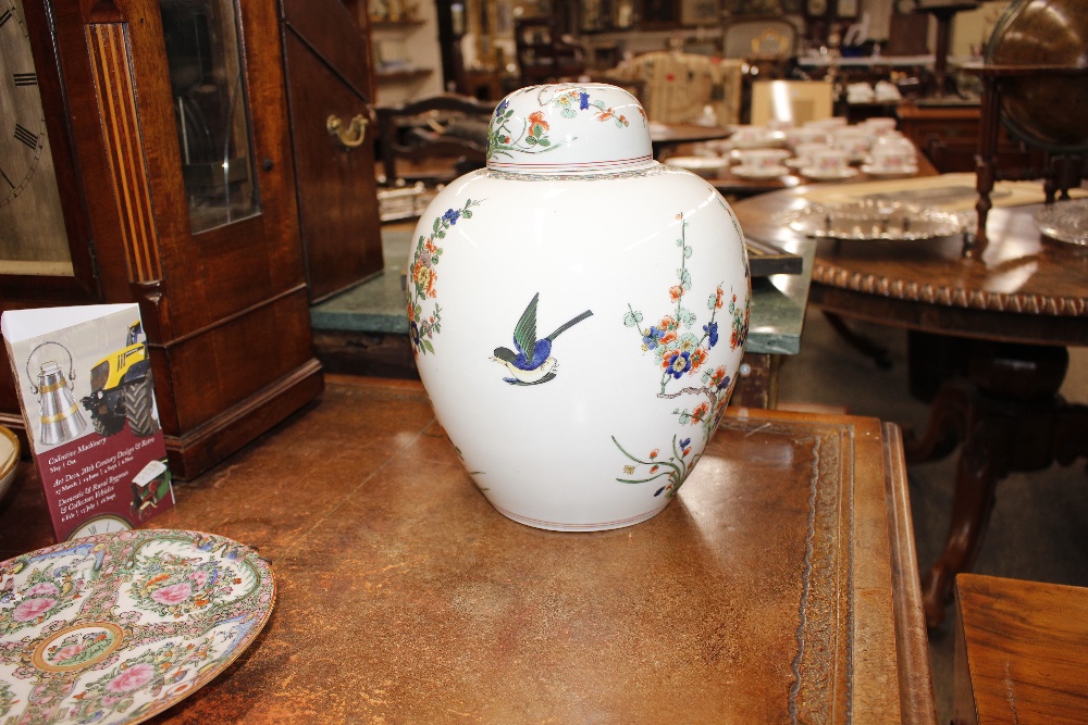 A pair of Chinese ginger jars and covers, having floral and bird decoration, 31cm high - Image 3 of 17