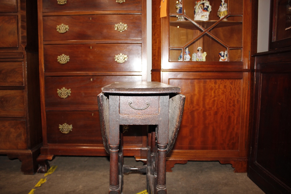 An 18th Century oak gate leg table, raised on turned supports terminating in Braganza type feet, - Image 5 of 23