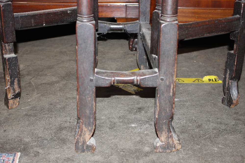 An 18th Century oak gate leg table, raised on turned supports terminating in Braganza type feet, - Image 11 of 23