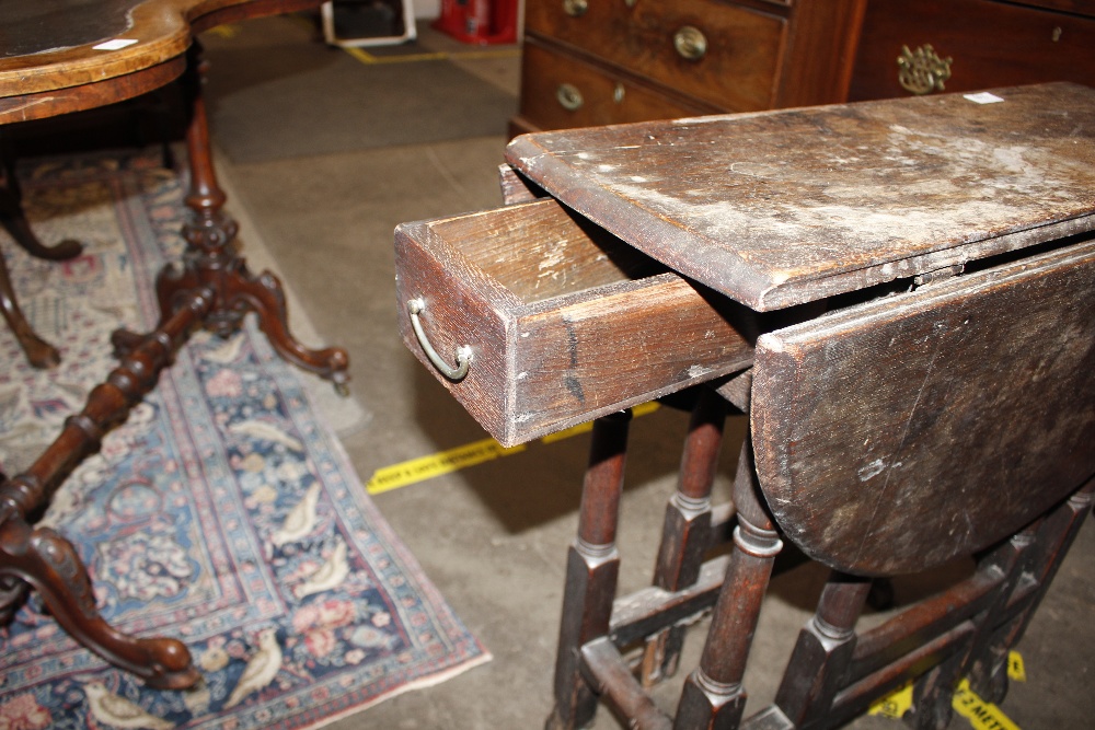 An 18th Century oak gate leg table, raised on turned supports terminating in Braganza type feet, - Image 6 of 23