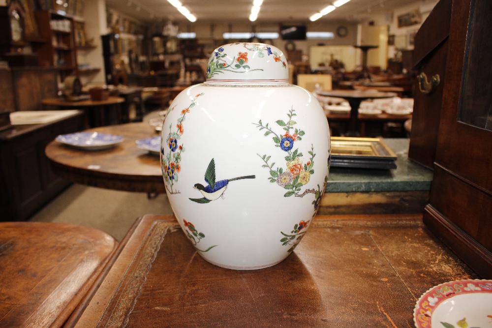 A pair of Chinese ginger jars and covers, having floral and bird decoration, 31cm high - Image 11 of 17