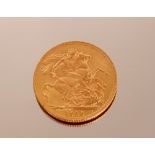 A George V gold Sovereign 1913