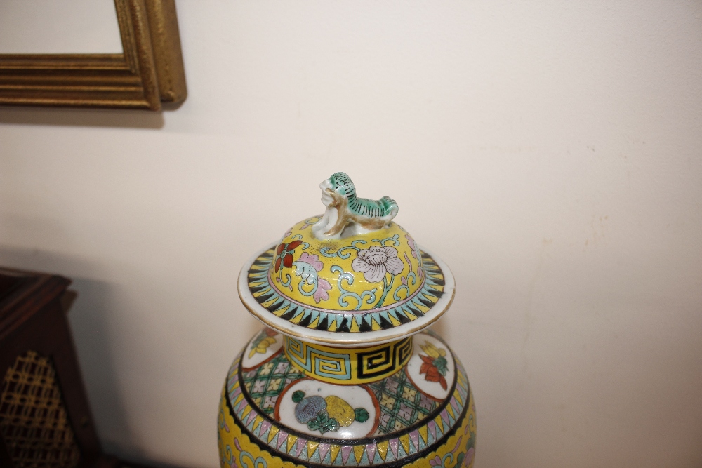 A Chinese famille jaune baluster vase, the cover surmounted by a Kylin finial decorated with - Image 2 of 11