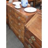 A 19th Century mahogany chest, of two short and three long drawers, raised on bracket supports 102cm