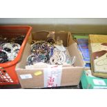 A box of various costume jewellery, beads etc.