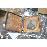 An early Daguerreotype portrait in carved case