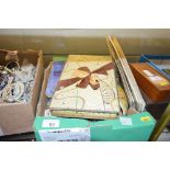 A box of miscellaneous items including maps, deeds