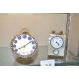 A mother of pearl cased carriage clock and a ball