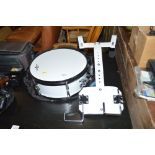 A Gear 4 Music drum and a harness