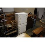 A pair of modern chests fitted four drawers