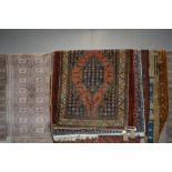 An approx 4'10" x 3'4" Eastern patterned rug