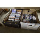Two boxes of DVDs and CDs