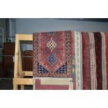 An approx 3'6" x 2' Eastern patterned rug
