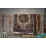 An approx 6' x 4'4" floral patterned rug
