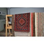 An approx 4'6" x 2'10" Bolochi rug
