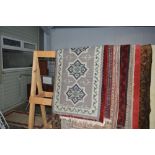 An approx 4' x 2'3" Eastern patterned rug