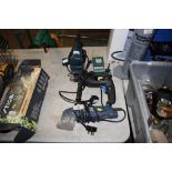 An orbital sander; and a Powerbase hammer drill; a