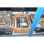 A box of unframed prints etc