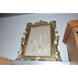 A modern gold painted picture frame