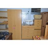 A bedroom suite comprising of a two door wardrobe,