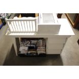 A white painted child's desk fitted three drawers