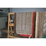 An approx 5'6" x 3' Eastern patterned rug