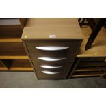 A modern chest fitted four drawers