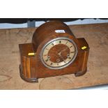 A three hole mantel clock