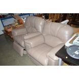 A leatherette upholstered reclining armchair ; and