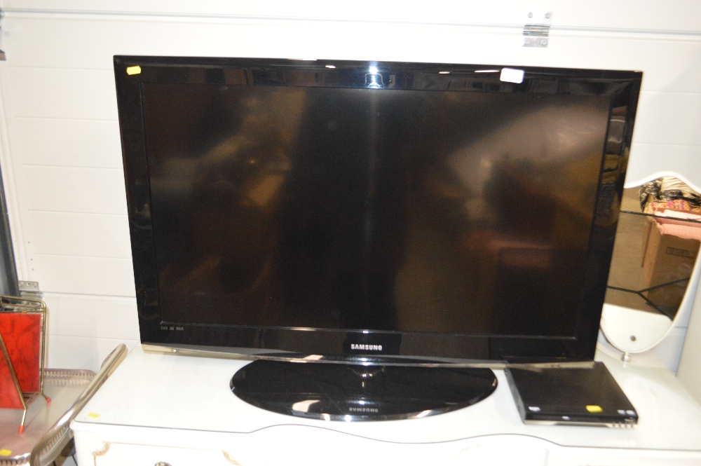 A Samsung flat screen television lacking remote co