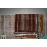 An approx 5'9" x 3'10" Eastern patterned rug