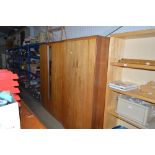 Two teak two door wardrobes