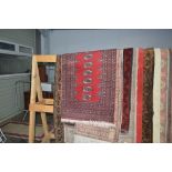 An approx 4' x 2'4" red Eastern patterned rug