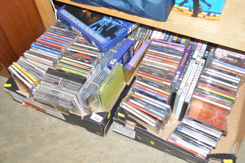 Two boxes of various CD's and DVD's