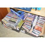 Two boxes of various CD's and DVD's