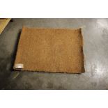 An approx 3'4" x 2'4" door mat and one other