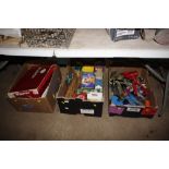 Three boxes of toys; tins; games etc