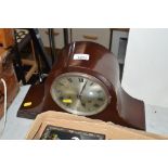 A two hole mantel clock