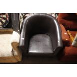 A leatherette upholstered tub chair