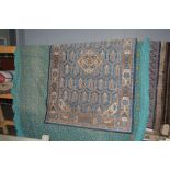 An approx 5'10" x 4' blue patterned rug
