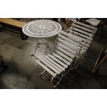 A metal white painted garden table together with t